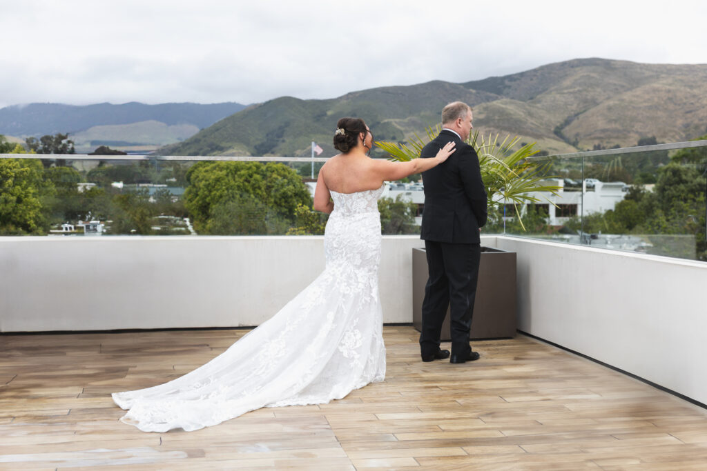 Bride and groom sharing their first look on the balcony at Hotel Cerro in downtown San Luis Obispo